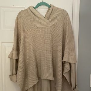 Cream colored tunic sweater size XL?